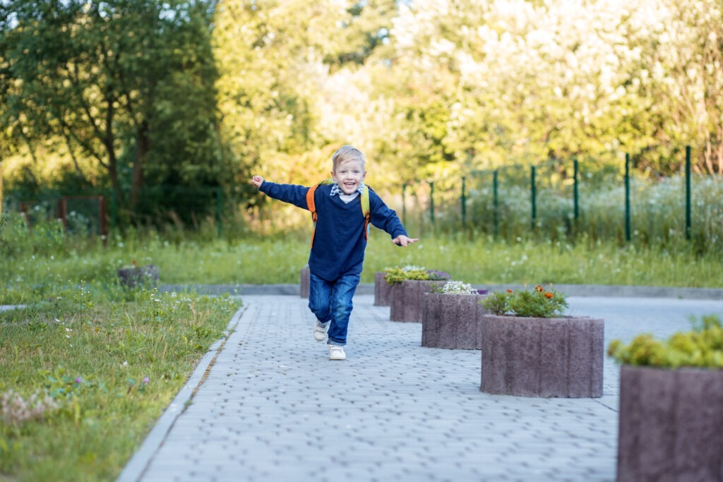 a happy child is running with a backpack 2023 11 27 05 08 40 utc