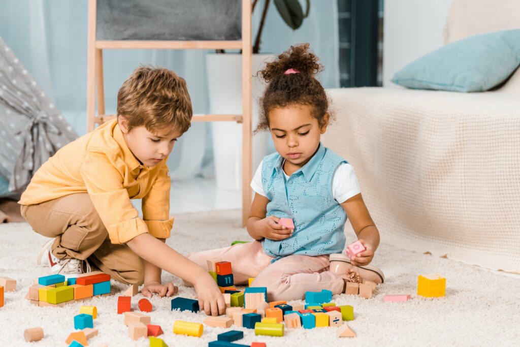 adorable multiethnic kids playing with colorful wo 2023 11 27 04 46 12 utc