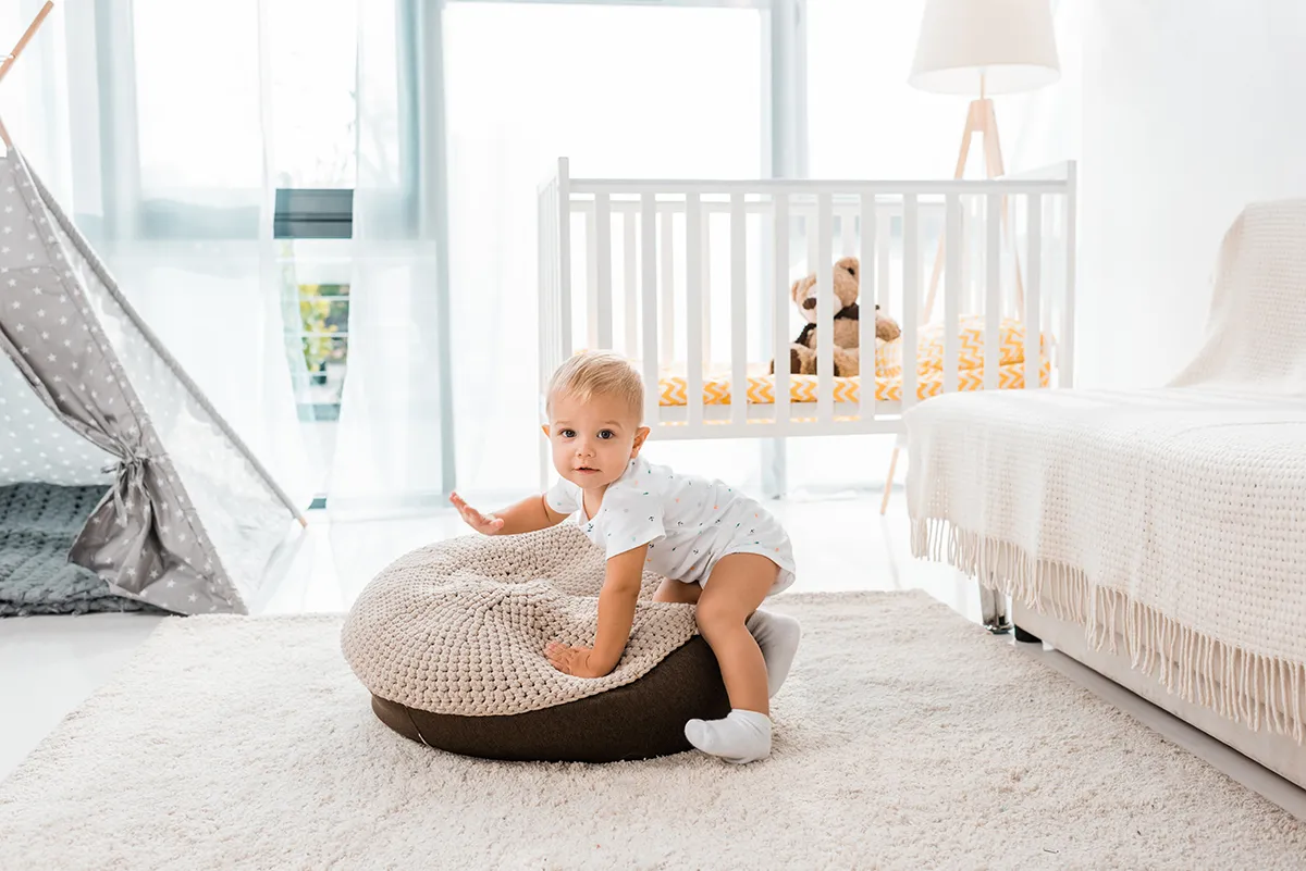 adorable toddler in white nursery room 2023 11 27 05 02 06 utc