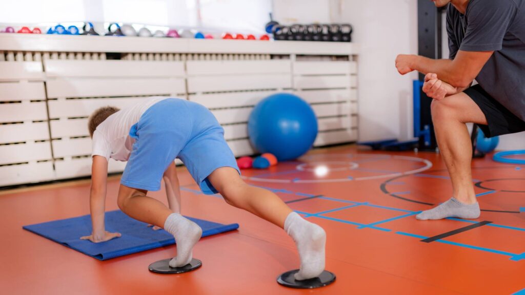 Child doing mountain climbers for better core and abdominal muscle strength